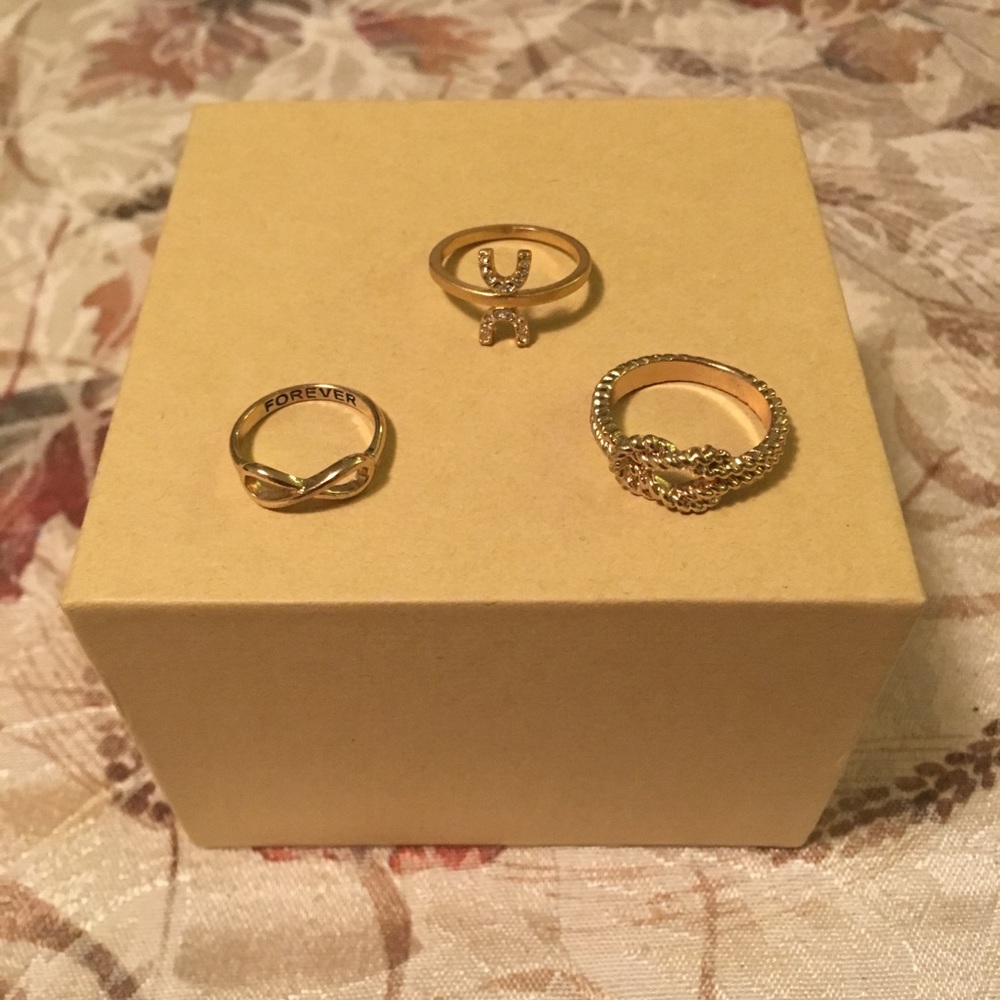 Trio of golden infinity rings